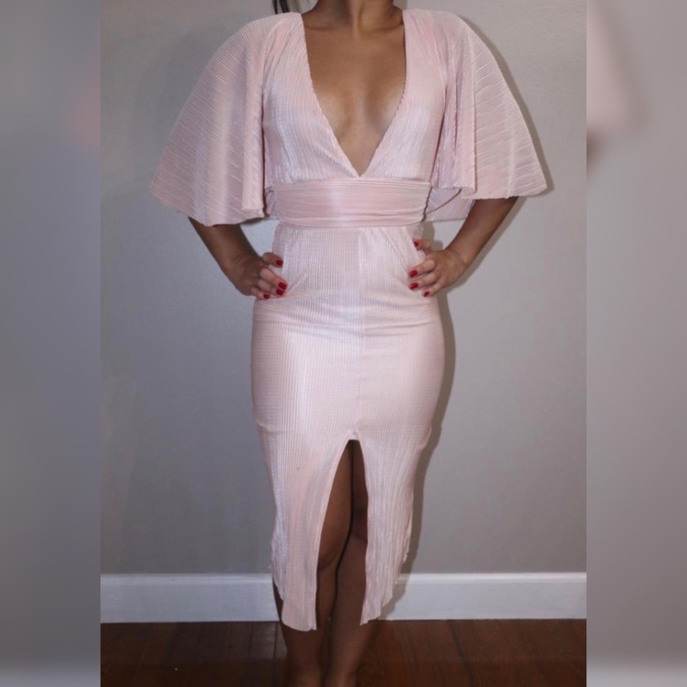 A pink v neck dress